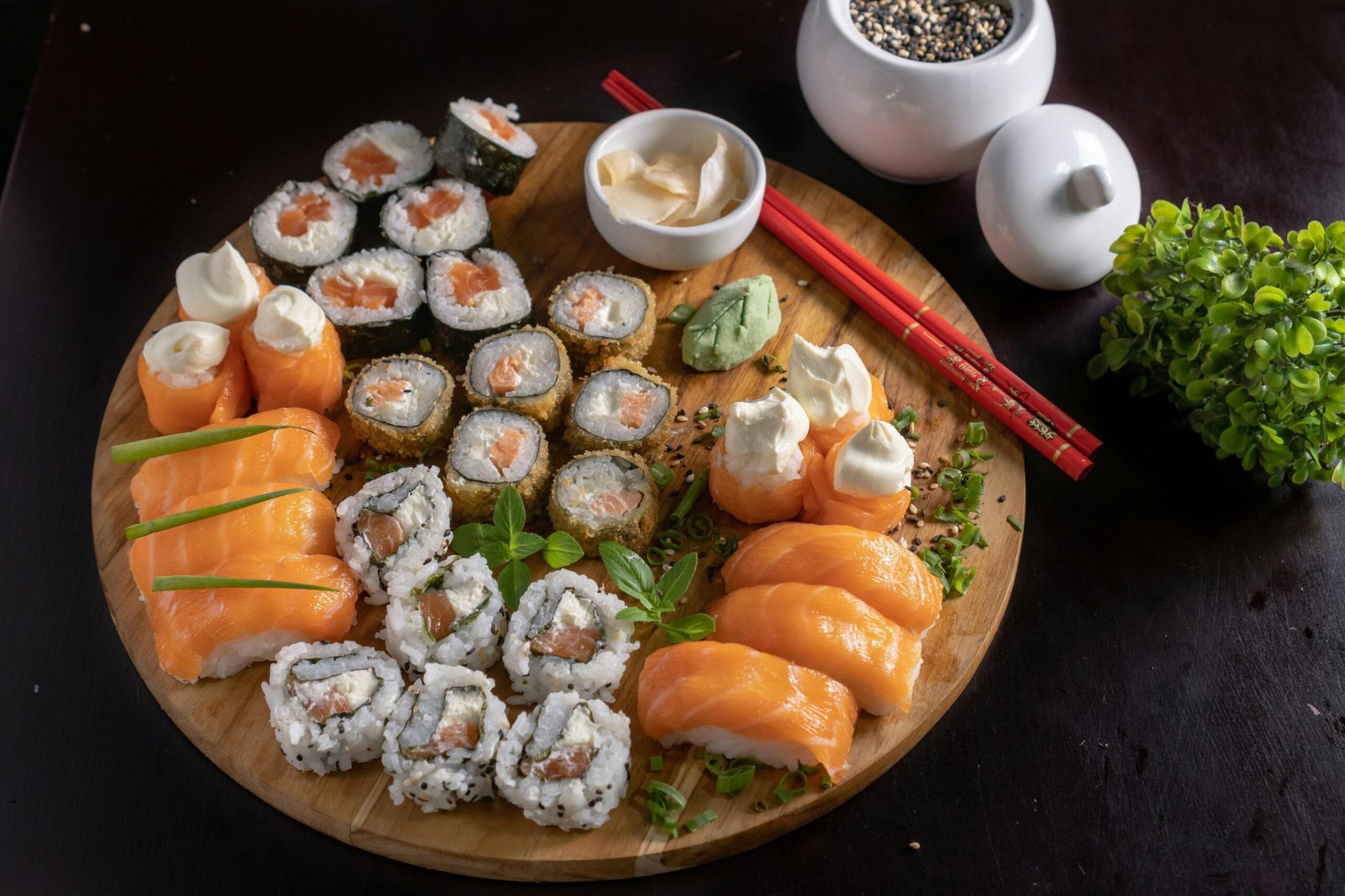 A beautifully arranged platter of assorted sushi, showcasing Japanese culinary art.